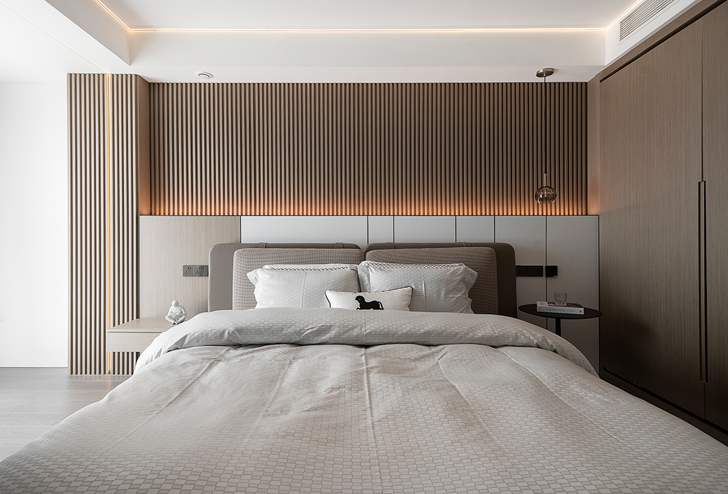 簡約現代三居臥室床頭背景墻裝修效果圖