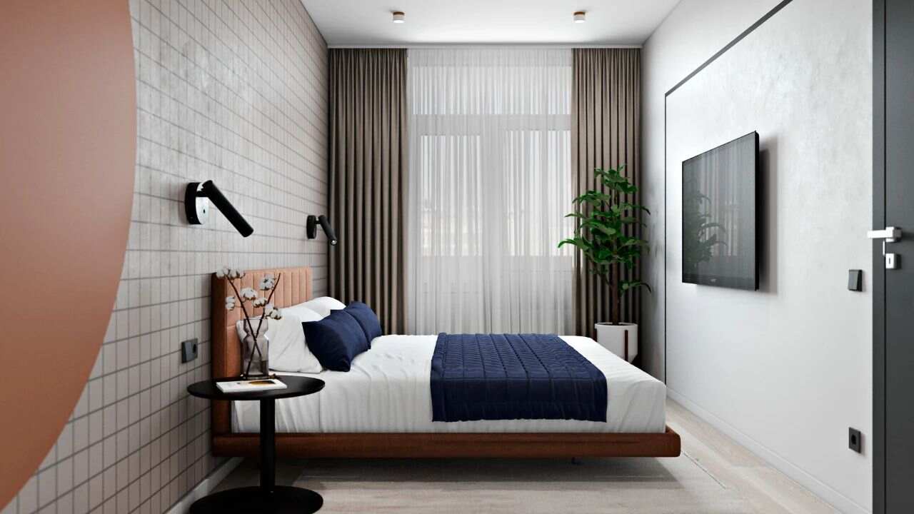 卧室面积不大，但是作为公寓活动空间刚好，床用采用悬空的设计也是最近比较流行的一种手法。